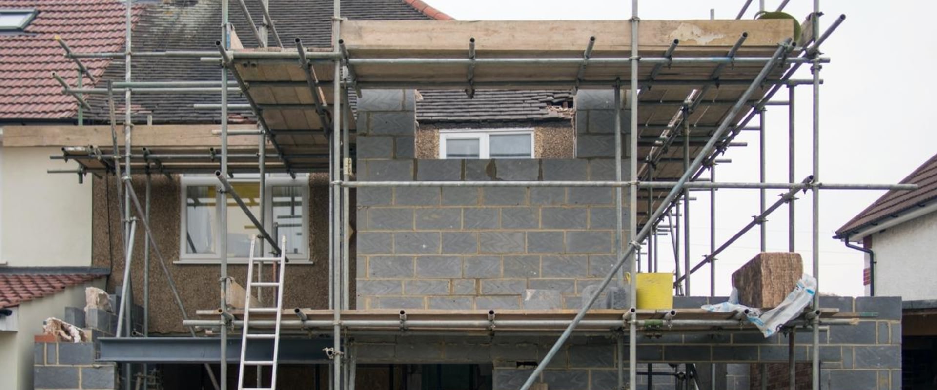 What is the most commonly used material in the construction of walls?